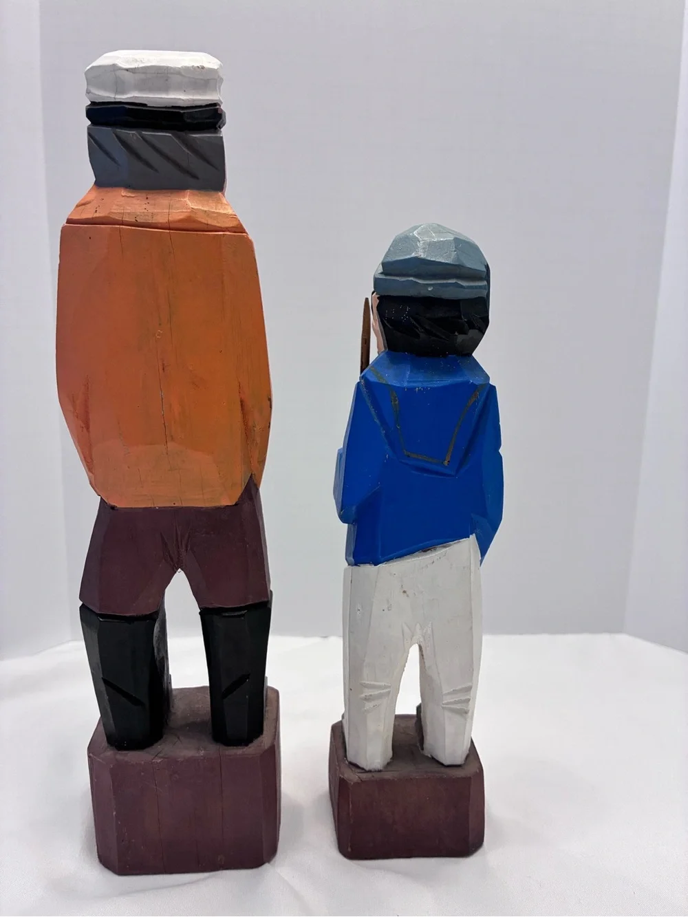 Vintage hand carved sea captain and first mate